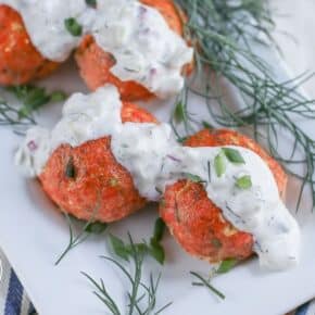 These Salmon Meatballs with Caper Dill Tarter Sauce are a fun (and delicious) way to get more healthy salmon into your family's meals!  Loaded with healthy fats, keto/low carb friendly and made without any gluten or grains! 