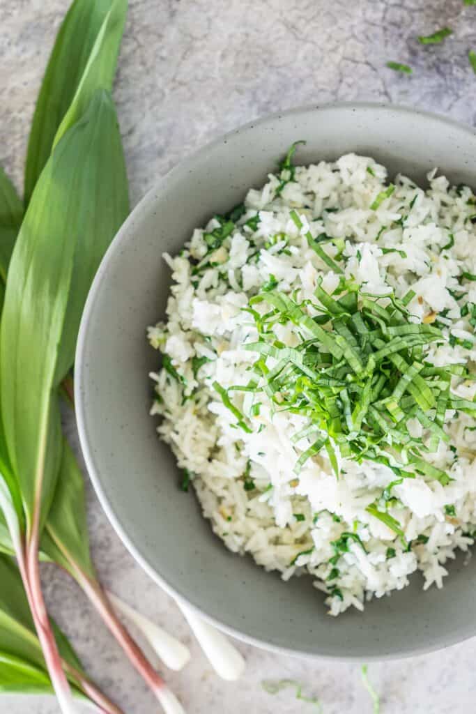 bowl of ramp rice and fresh ramps