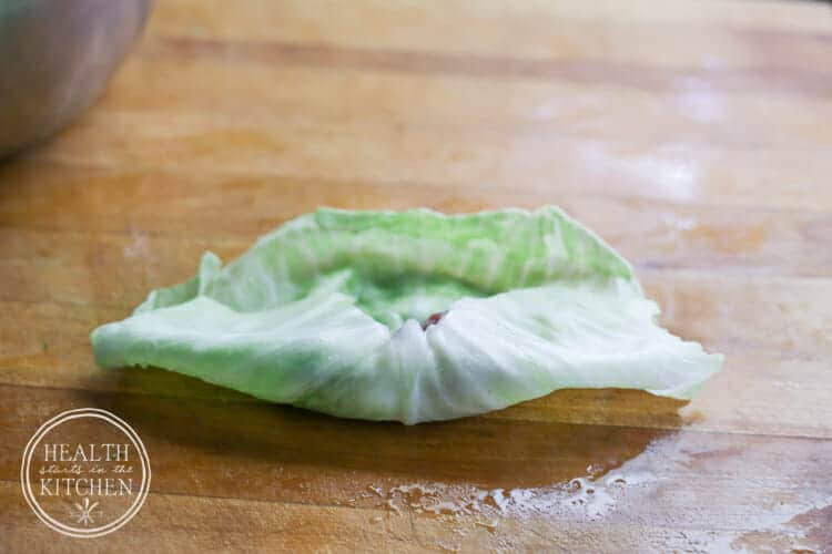 Bottom edge of a cabbage leaf folded over the filling