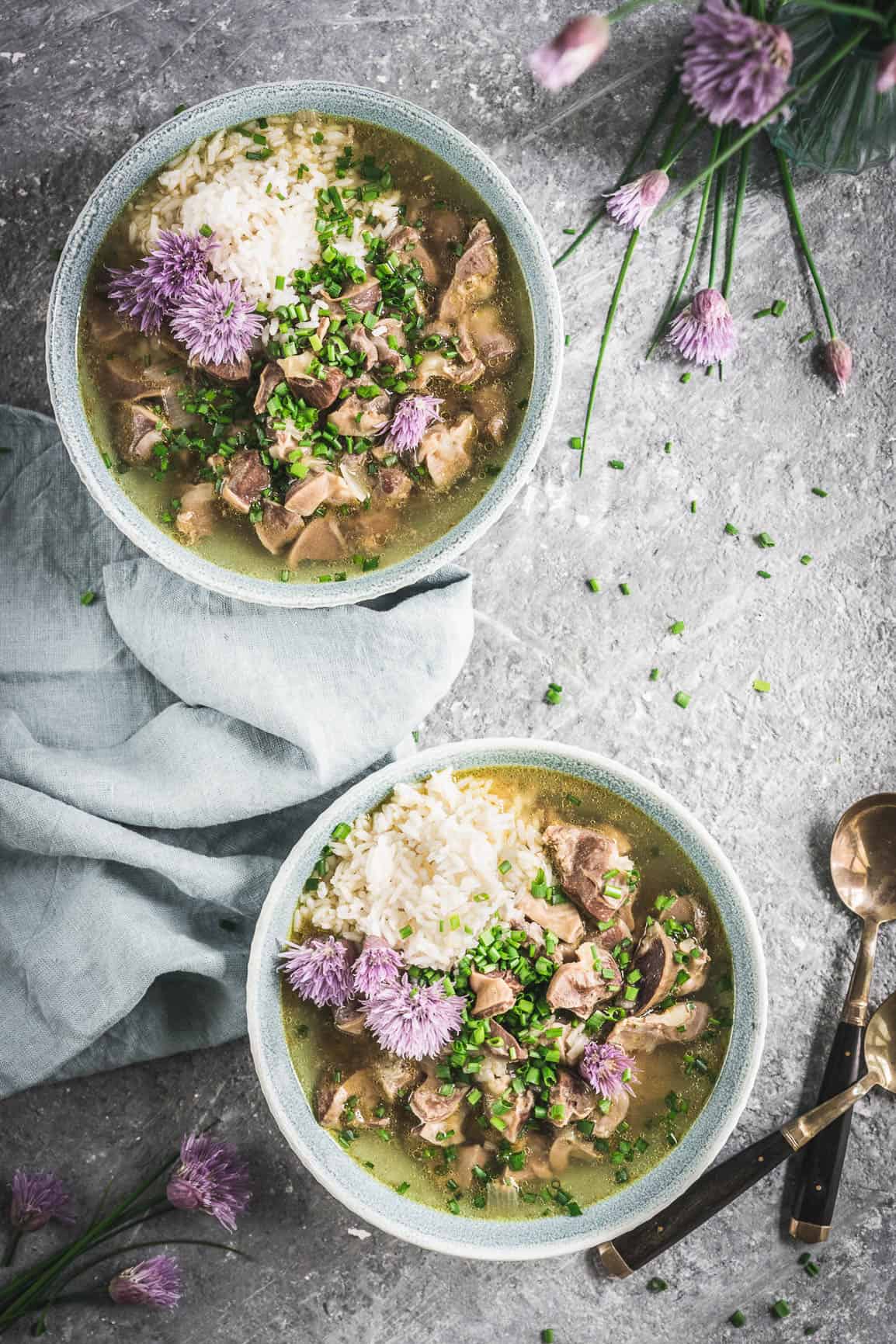 Pressure Cooker Chicken Gizzards and Broth served with Rice and Chive Blossoms 