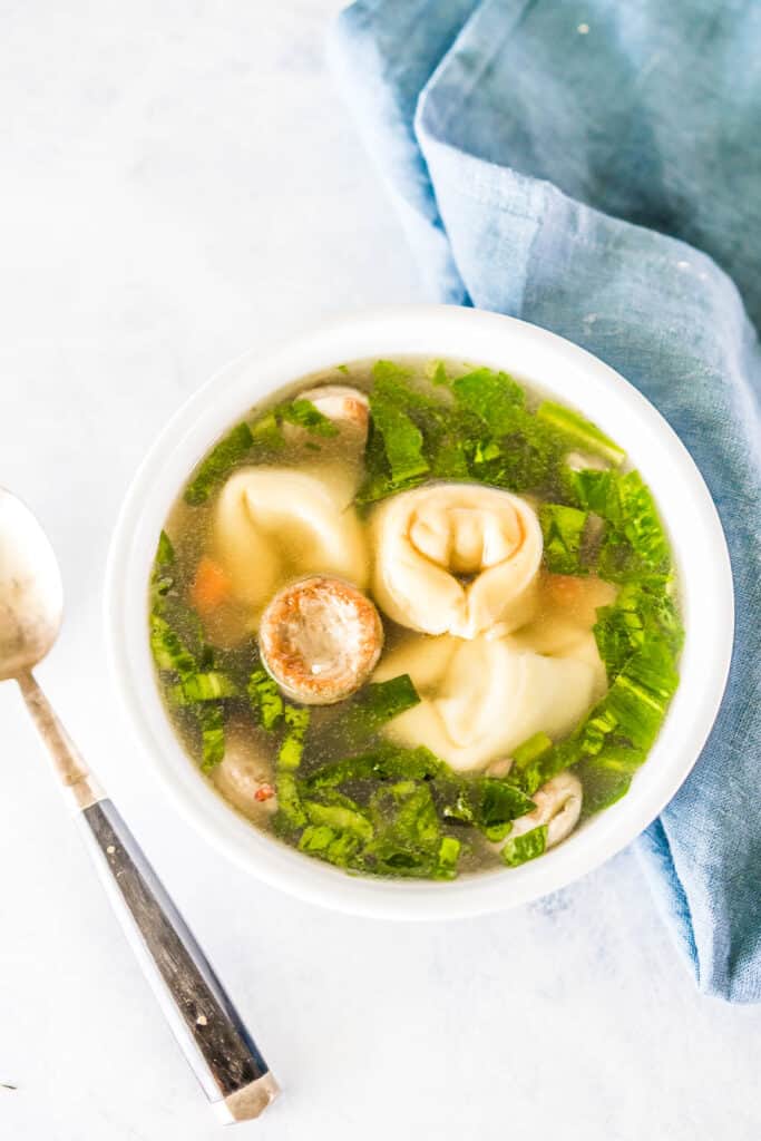 Cheese tortellini and sliced sausage in chicken broth, generously seasoned with fresh spring ramp greens. A shockingly delicous combination of flavors which will remind you of Chinese Restaurant Won-Ton Soup only better with my Easy Sausage Tortellini Soup with Ramp Greens!