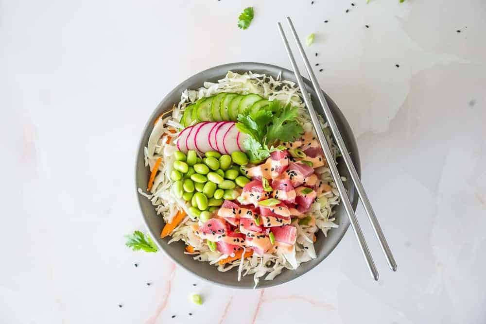 Making Poke at home may seem intimidating but with my Easy Keto Spicy Ahi Tuna Poke Bowl Recipe, you'll be shocked at how easy making your restaurant favorite dish at home can be! 