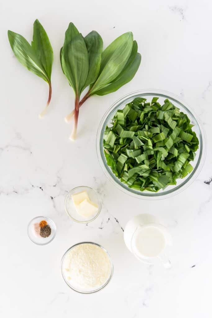 ingredients in glass bowls for creamed ramp greens recipe