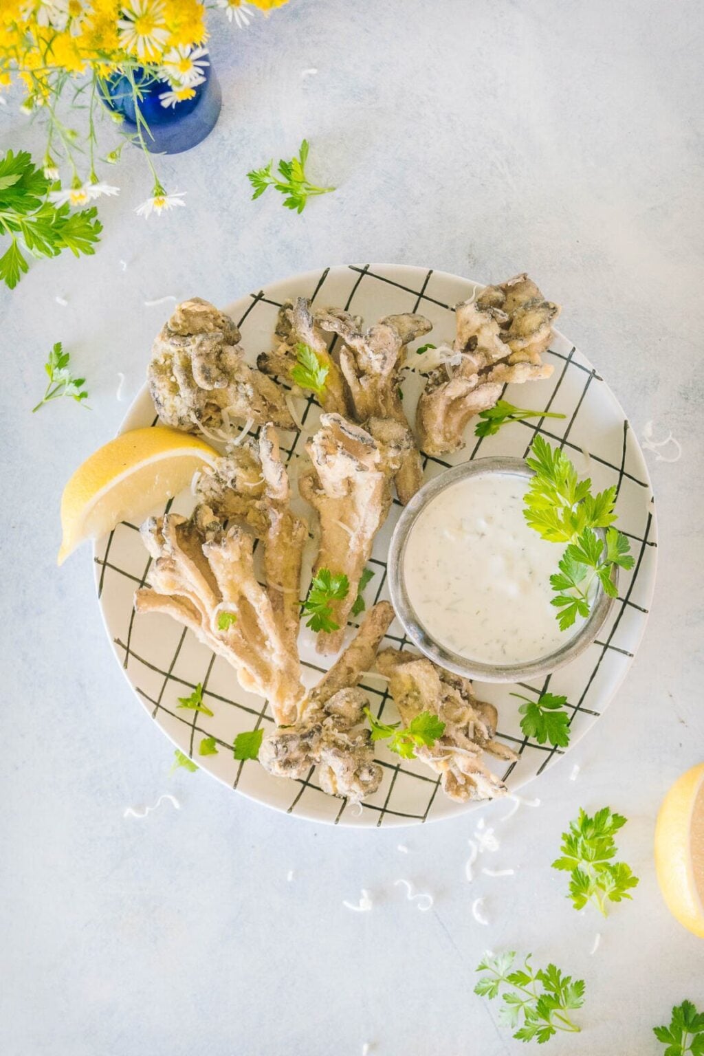 Crispy breaded maitake mushrooms ready to serve