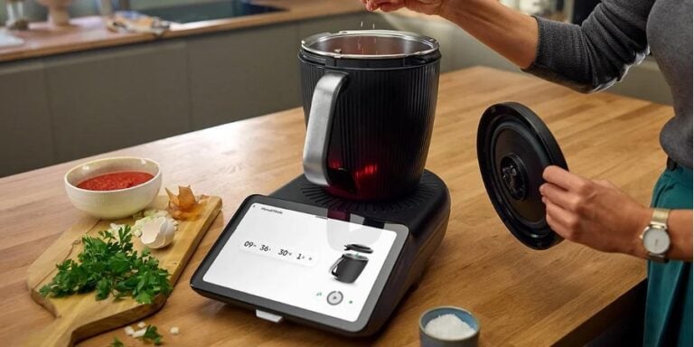 Person cooking with a smart appliance
