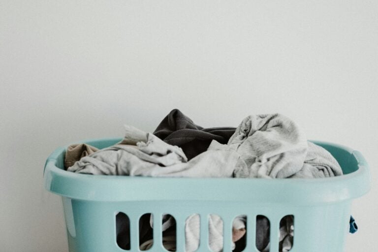 Full laundry basket with clothes