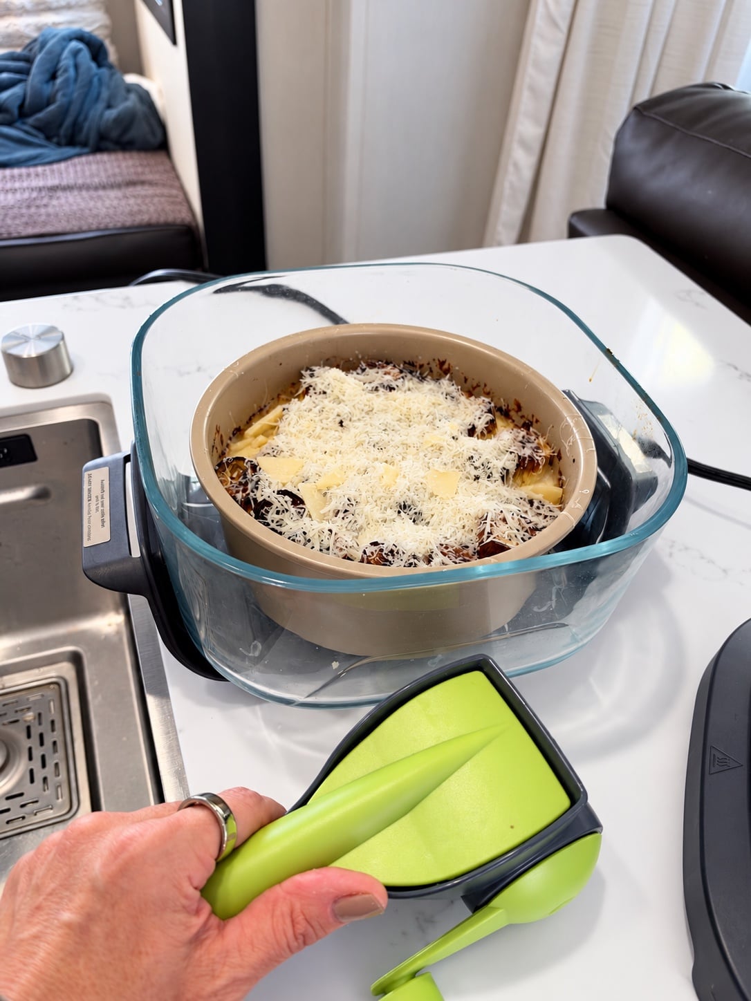 Freshly grated Parmesan over deeply browned leek tops before the final melt
